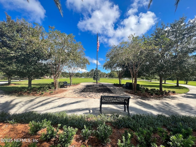 surrounding community featuring a lawn