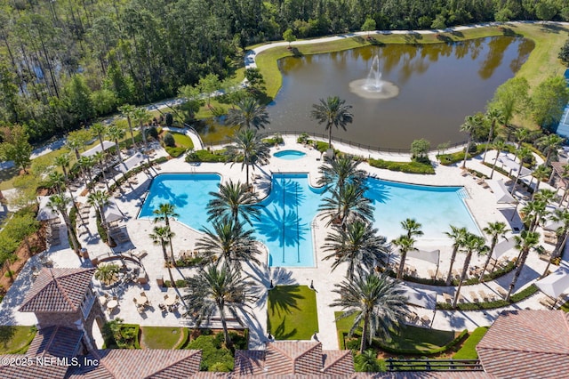 birds eye view of property featuring a water view