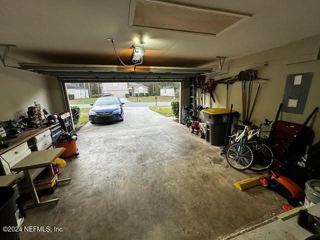 garage with electric panel