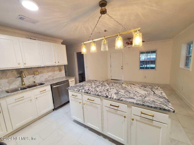 kitchen with white cabinetry, dishwasher, decorative light fixtures, and sink