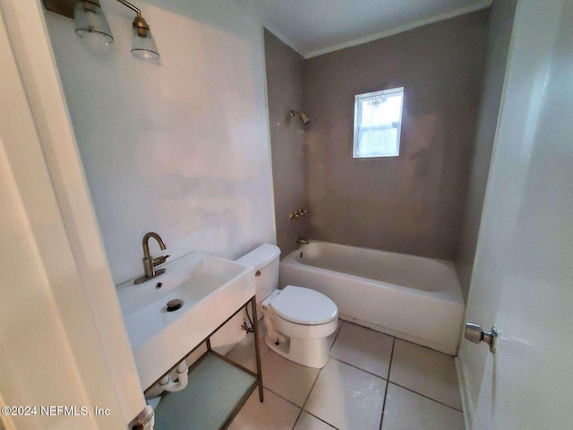 bathroom with tile patterned floors and toilet