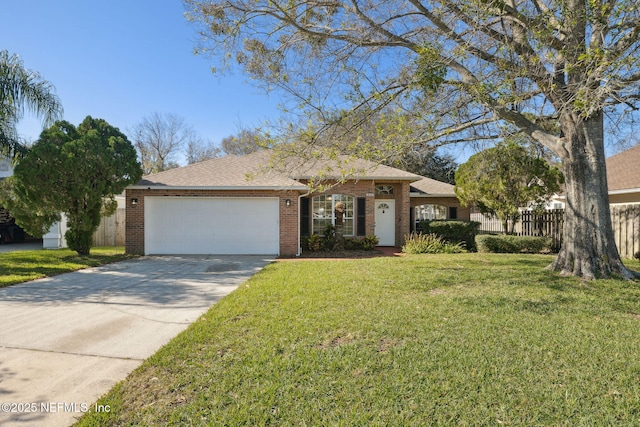 ranch-style home featuring a garage and a front lawn