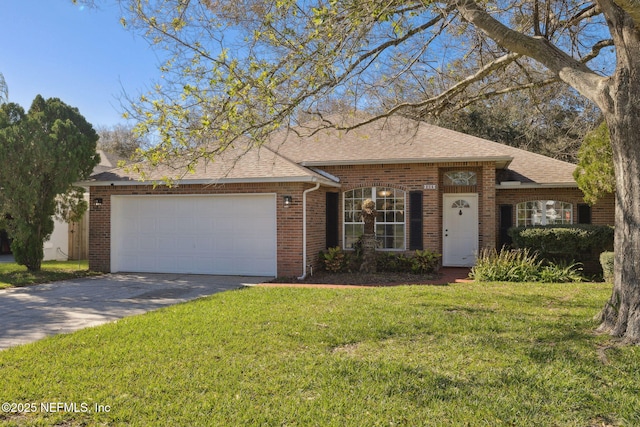 single story home with a front yard and a garage