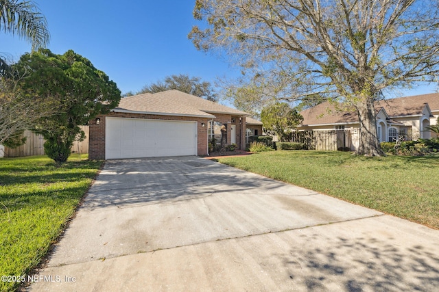 single story home with a front yard and a garage