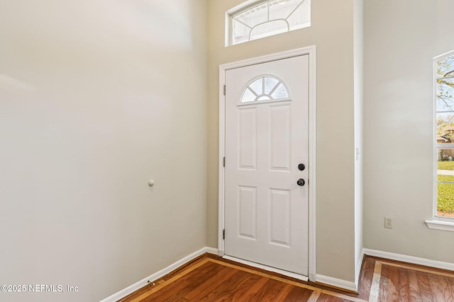 entrance foyer with hardwood / wood-style floors