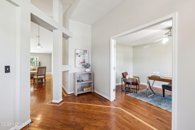 hall with wood-type flooring