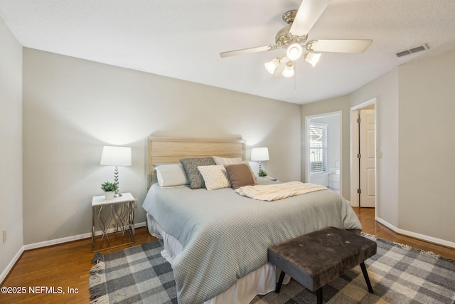 bedroom featuring ceiling fan and hardwood / wood-style floors