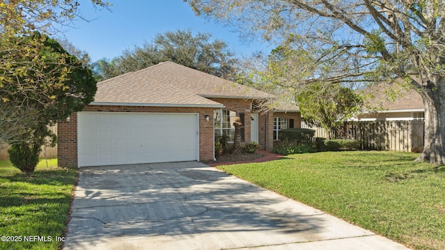 ranch-style house with a front yard and a garage