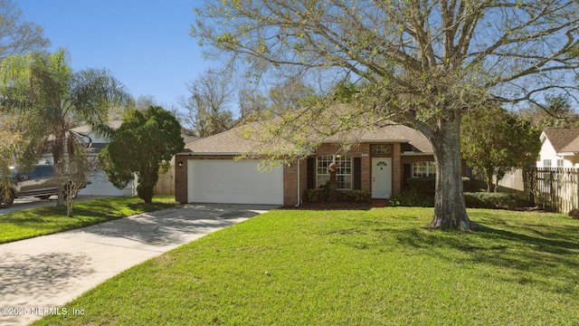 view of front of house featuring a front yard and a garage