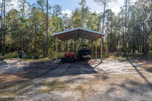 view of parking with a carport