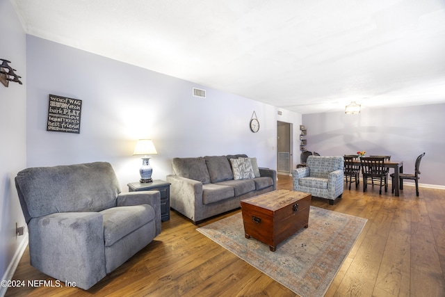 living room with dark wood-type flooring