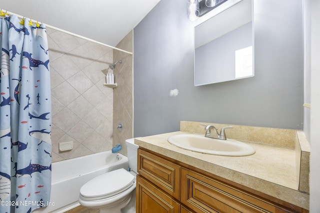 full bathroom featuring shower / bath combo, toilet, and vanity