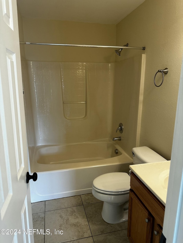 full bathroom with tile patterned floors, vanity, toilet, and shower / bathing tub combination