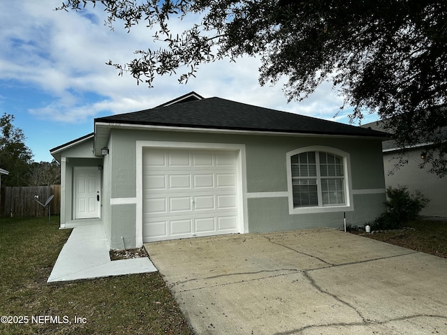 view of side of property with a garage