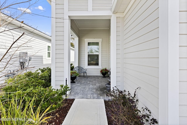 doorway to property with a patio