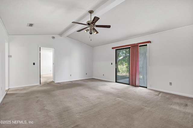 spare room with ceiling fan, vaulted ceiling with beams, light carpet, and a textured ceiling