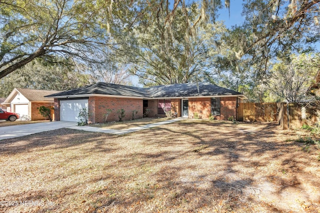 single story home featuring a garage