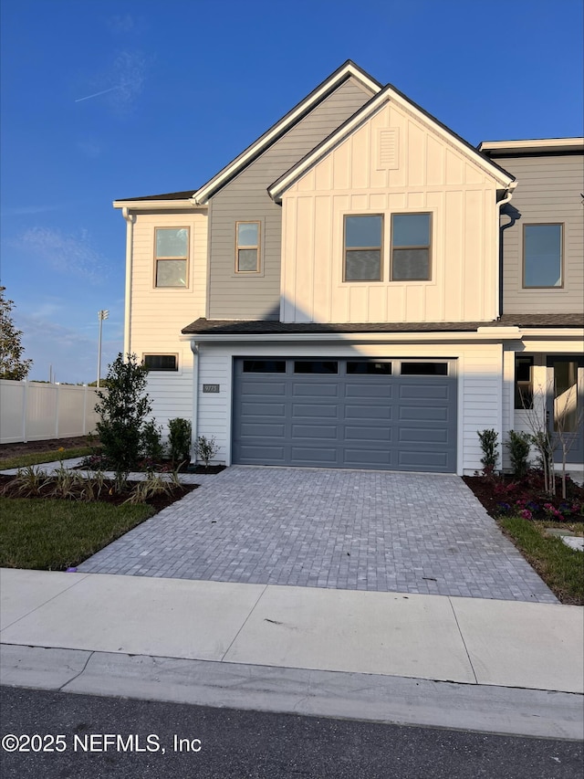 view of front of property featuring a garage