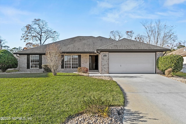 single story home with a front yard and a garage