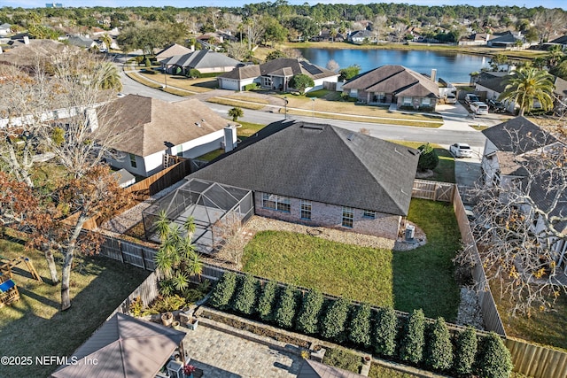 drone / aerial view featuring a water view