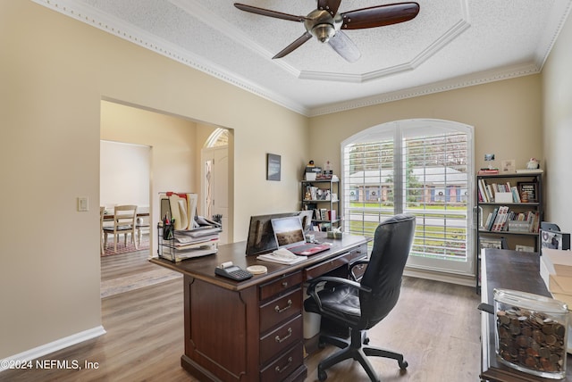 office area featuring light hardwood / wood-style floors, a textured ceiling, and ceiling fan