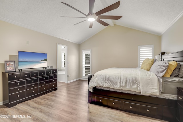 bedroom with ceiling fan, light hardwood / wood-style floors, lofted ceiling with beams, multiple windows, and a textured ceiling