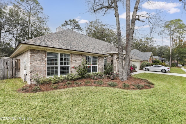 view of property exterior featuring a yard and a garage