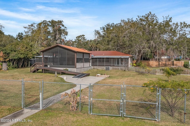 view of yard featuring a sunroom