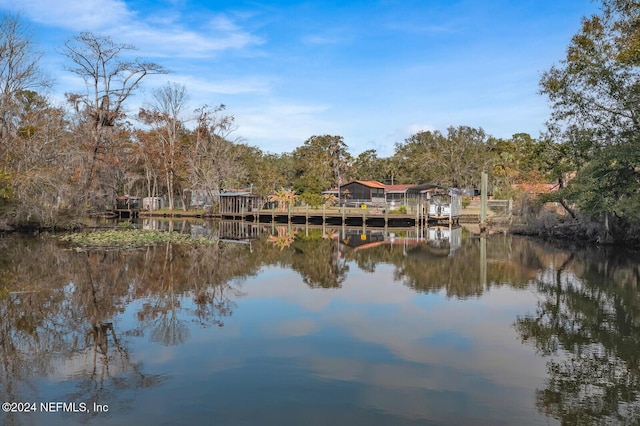 property view of water with a boat dock