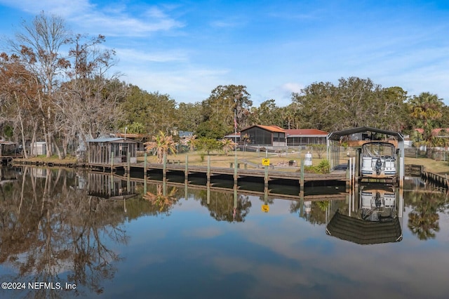 dock area with a water view