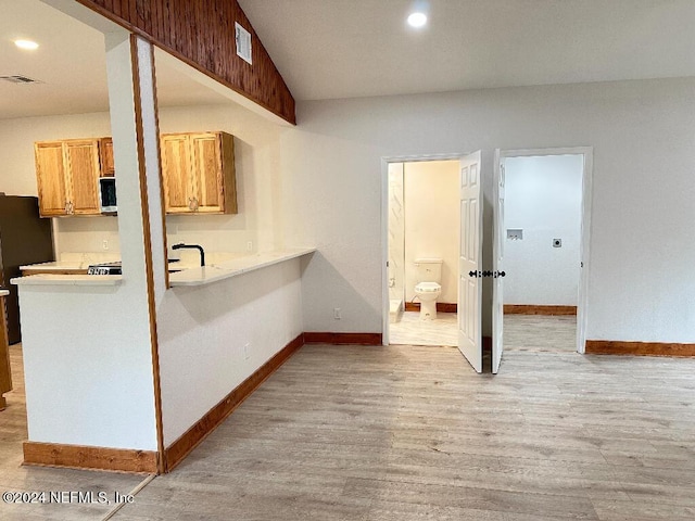 kitchen with light hardwood / wood-style floors