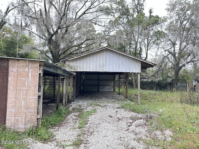 exterior space featuring a carport