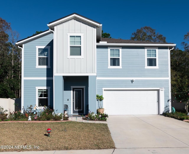 view of front of home with a garage