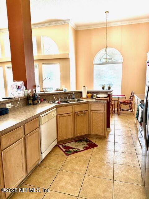 1837 The Glades Rd, Middleburg, FL 32068 - kitchen with dishwasher, crown molding, light tile patterned floors, pendant lighting, and a peninsula