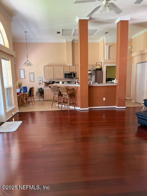 1837 The Glades Rd, Middleburg, FL 32068 - living area featuring crown molding, wood finished floors, and ceiling fan
