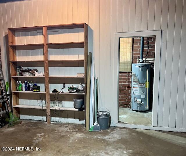 storage area featuring gas water heater