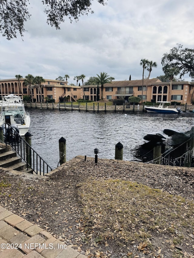 dock area with a water view