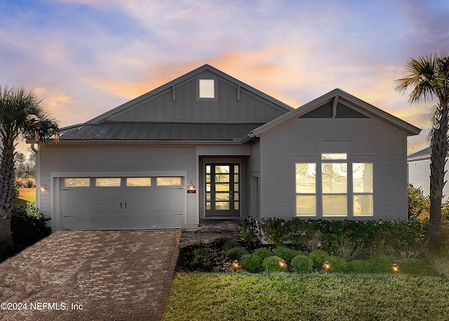 view of front of home with a garage