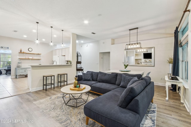 living room with light hardwood / wood-style floors