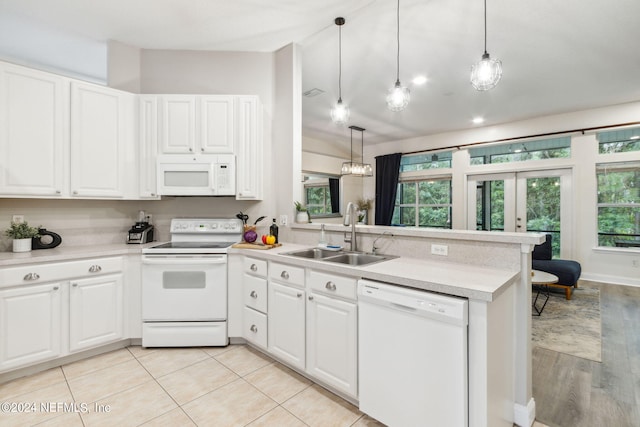 kitchen featuring white cabinets, white appliances, and sink