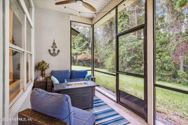 sunroom featuring plenty of natural light and ceiling fan