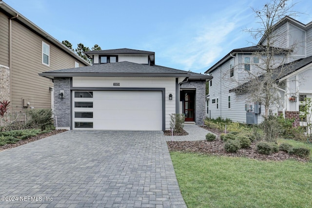 view of front of home with a garage