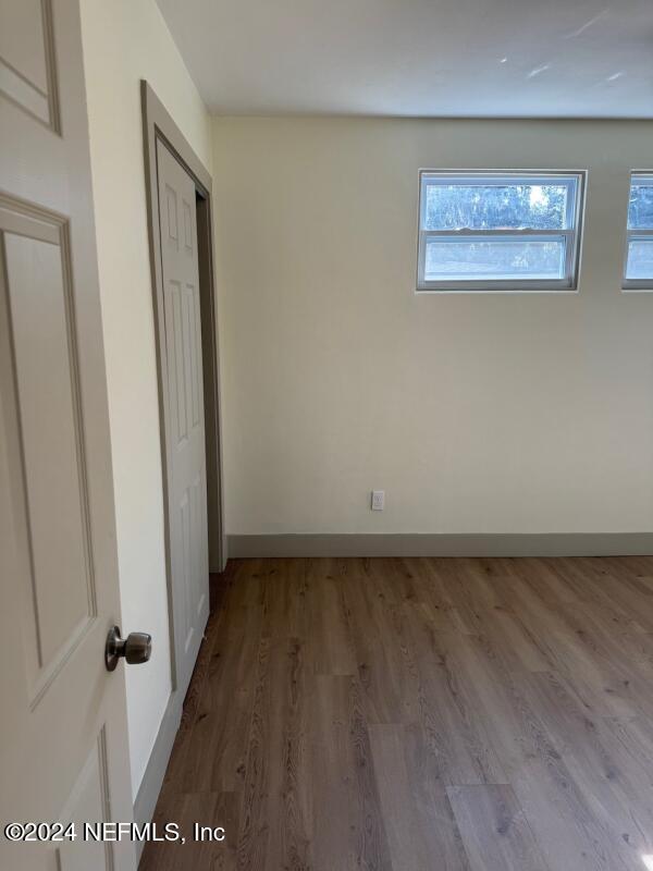 unfurnished bedroom featuring light hardwood / wood-style floors