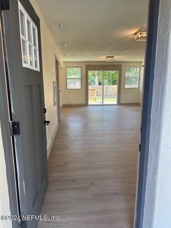 hallway featuring light hardwood / wood-style floors