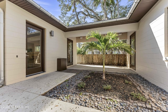 doorway to property featuring a patio area