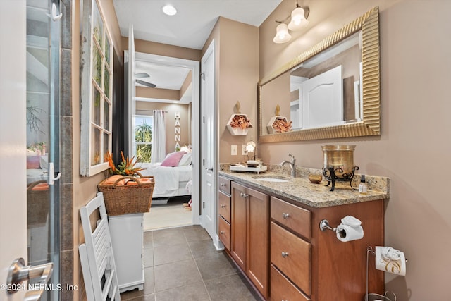 bathroom featuring tile patterned floors and vanity