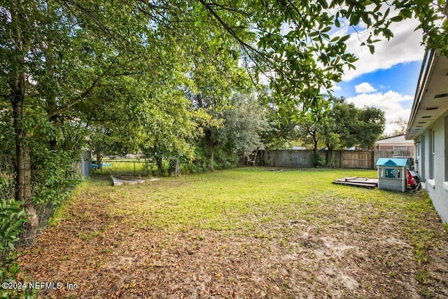 view of yard with a deck