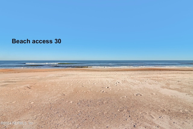 property view of water with a beach view