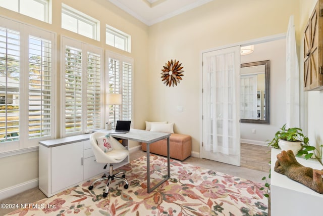 home office with crown molding and plenty of natural light