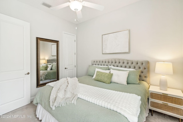 carpeted bedroom featuring ceiling fan